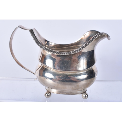 819 - A Georgian Silver Cream Jug by Thomas Dicks.  Hallmarked London 1814..  13.6cm x 9.2cm x 7cm, weight... 