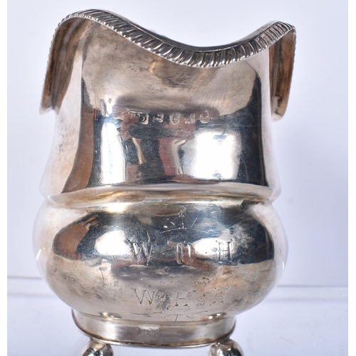 819 - A Georgian Silver Cream Jug by Thomas Dicks.  Hallmarked London 1814..  13.6cm x 9.2cm x 7cm, weight... 