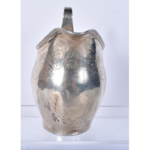 820 - A Georgian Silver Cream Jug.  Unmarked..  11.2cm x 11.3cm x 7.2cm, weight 94.9g