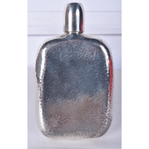 824 - A Silver Hip Flask with Hammered and Engraved Finish.  Stamped 950.  15.2cm x 9.2cm x 2.5cm, weight ... 