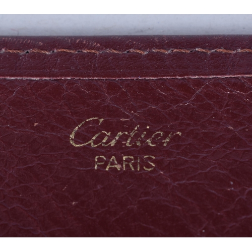 830 - Vintage CARTIER Burgundy Leather Money Purse / Wallet.  10.8cm x 19.5cm