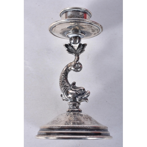 838 - A Pair of Continental Silver Weighted Candlesticks with Carp Stems.  9.2cm x 5.1cm, total weight 175... 