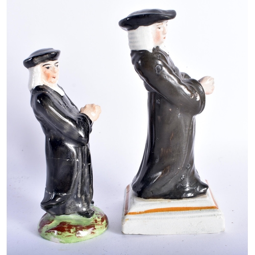 853 - TWO EARLY 19TH CENTURY STAFFORDSHIRE FIGURES both modelled as males in black robes. Larges 12.5 cm h... 