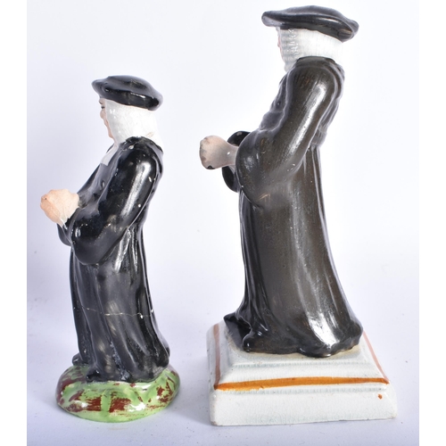 853 - TWO EARLY 19TH CENTURY STAFFORDSHIRE FIGURES both modelled as males in black robes. Larges 12.5 cm h... 