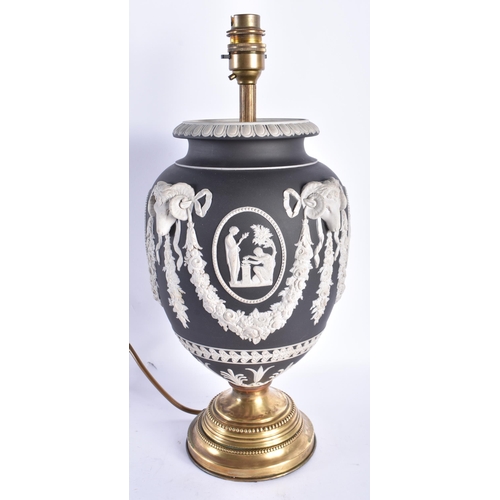 855 - A FINE ANTIQUE WEDGWOOD BLACK JASPERWARE COUNTRY HOUSE LAMP decorated with classical figures and ram... 