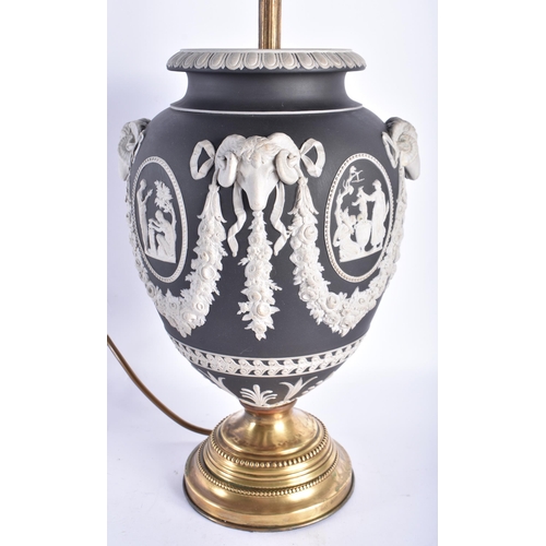 855 - A FINE ANTIQUE WEDGWOOD BLACK JASPERWARE COUNTRY HOUSE LAMP decorated with classical figures and ram... 