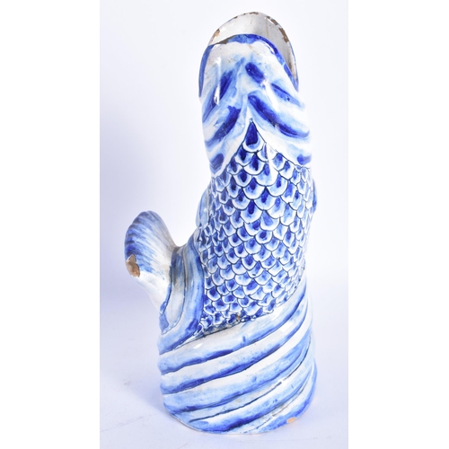 860 - AN ANTIQUE DELFT BLUE AND WHITE TIN GLAZED LEAPING FISH VASE. 21 cm high.