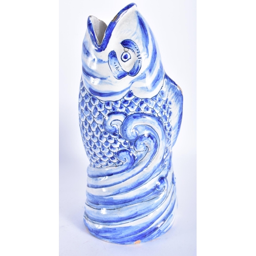 860 - AN ANTIQUE DELFT BLUE AND WHITE TIN GLAZED LEAPING FISH VASE. 21 cm high.