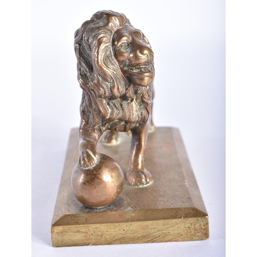 863 - A SMALL ANTIQUE BRONZE GRAND TOUR FIGURE OF A LION. 11 cm wide.