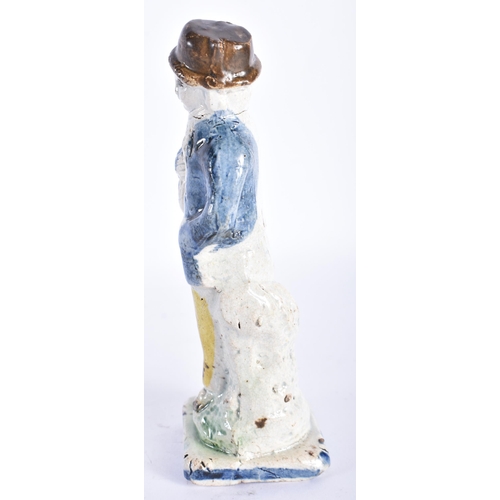 870 - AN 18TH/19TH CENTURY ENGLISH STAFFORDSHIRE FIGURE OF A MALE. 14 cm high.