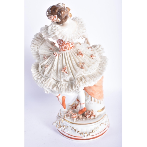 872 - A FINE ANTIQUE GERMAN PORCELAIN FRILLY DRESS DANCING GIRL. 20 cm high.