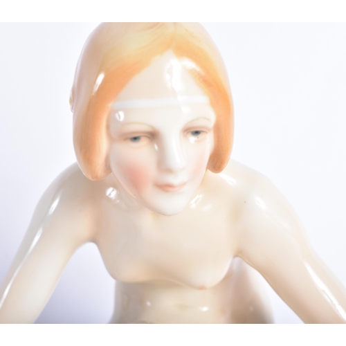 874 - A KARL ENS PORCELAIN FIGURE OF A NUDE FEMALE. 16 cm wide.