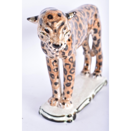 875 - AN UNUSUAL ART DECO AUSTRIAN KERAMIS FIGURE OF A CHEETAH. 20 cm wide.