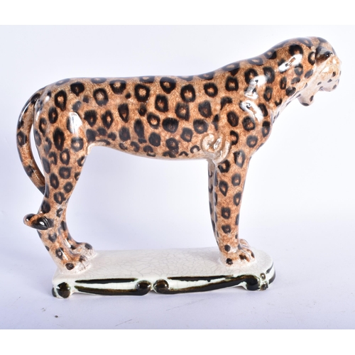 875 - AN UNUSUAL ART DECO AUSTRIAN KERAMIS FIGURE OF A CHEETAH. 20 cm wide.