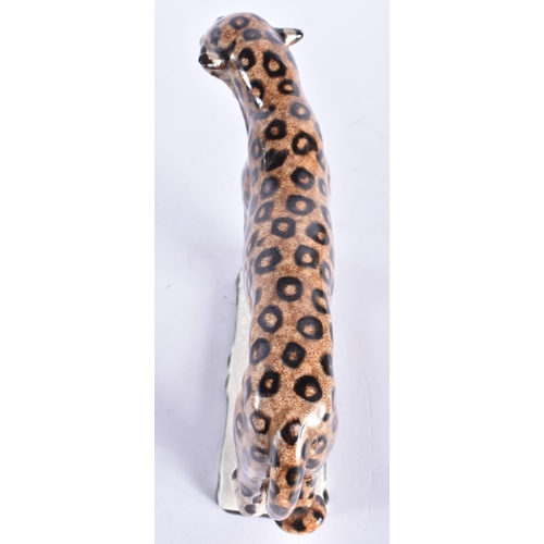 875 - AN UNUSUAL ART DECO AUSTRIAN KERAMIS FIGURE OF A CHEETAH. 20 cm wide.