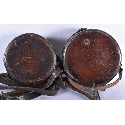 893 - TWO UNUSUAL ANTIQUE LEATHER CASED DETEX GUARDSMAN CLOCKS. Largest 16 cm wide. (2)