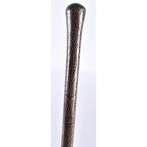 899 - A FINE 19TH CENTURY SILVER INLAID CARVED WOOD WALKING CANE. 83 cm long.