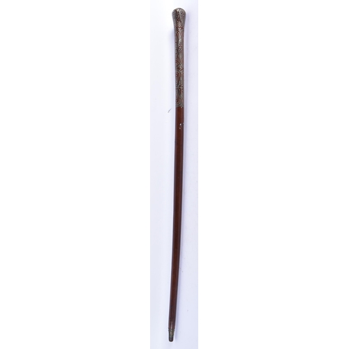 899 - A FINE 19TH CENTURY SILVER INLAID CARVED WOOD WALKING CANE. 83 cm long.