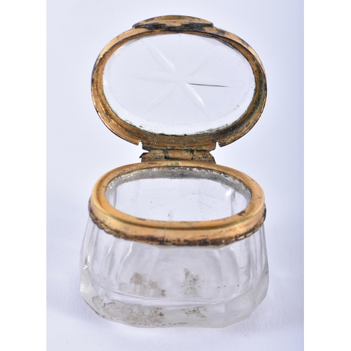 903 - A GEORGE III CRYSTAL GLASS SNUFF BOX together with a similar yellow metal acorn form Georgian box. L... 