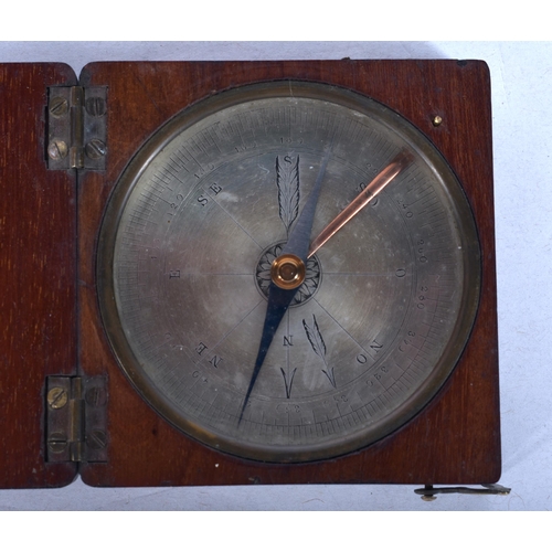 935 - AN ANTIQUE MAHOGANY CASED POCKET COMPASS. 6.5 cm square.