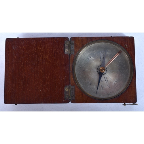 935 - AN ANTIQUE MAHOGANY CASED POCKET COMPASS. 6.5 cm square.