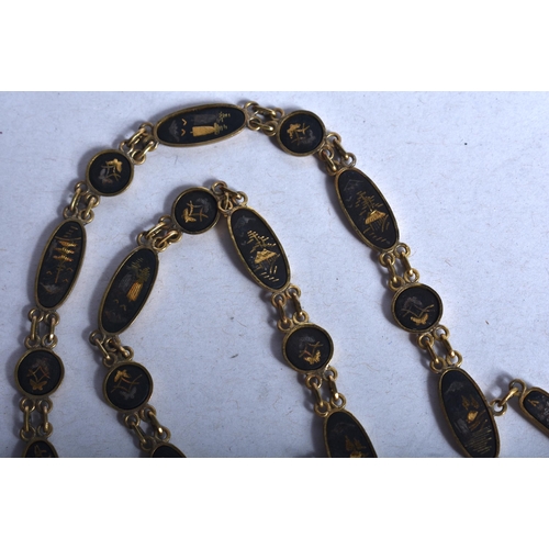 944 - A JAPANESE TAISHO PERIOD KOMAI STYLE DAMASCENED NECKLACE.31 grams. 52 cm long.