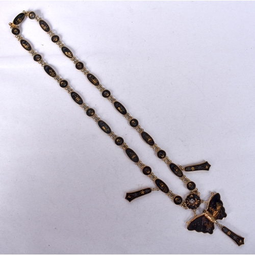 944 - A JAPANESE TAISHO PERIOD KOMAI STYLE DAMASCENED NECKLACE.31 grams. 52 cm long.