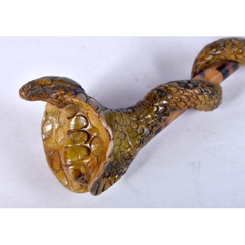 952 - A VINTAGE SNAKE WRAPPED CLAY AND BAMBOO PIPE. 22 cm long.