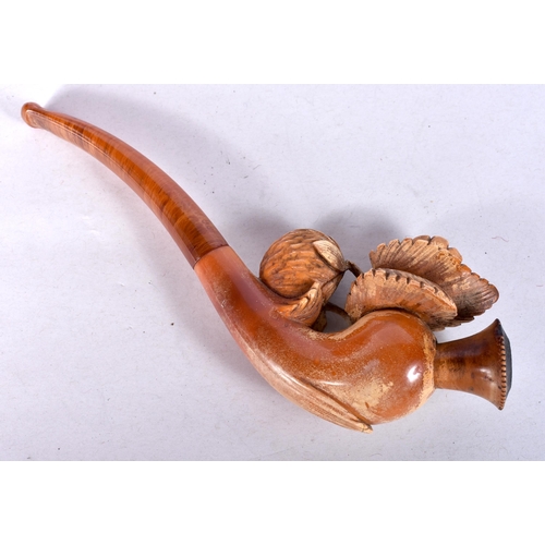 956 - AN ANTIQUE MEERSCHAUM AND AMBER FLOWER PIPE. 15 cm long.