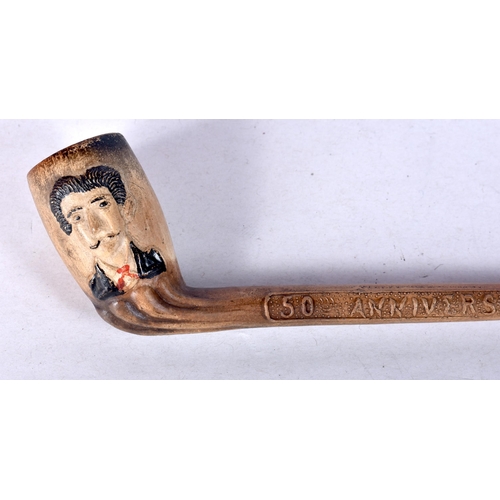 959 - AN UNUSUAL SCHMIDT ET FALLUER ANNIVERSARY CLAY PIPE.22 cm long.