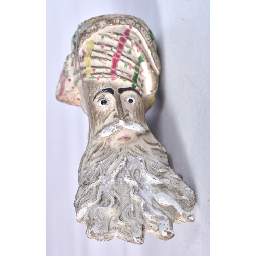 972 - A JACOB CLAY MASK HEAD PIPE. 8.5 cm long.