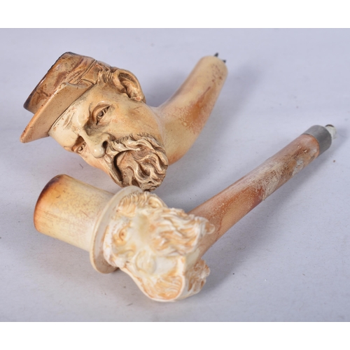 977 - TWO ANTIQUE MEERSCHAUM PORTRAIT PIPES. 9 cm long. (2)