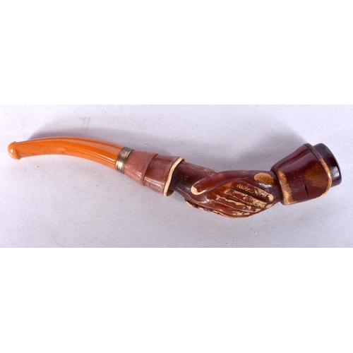 982 - AN ANTIQUE MEERSCHAUM SHAKING HANDS AMBER PIPE. 14 cm long.