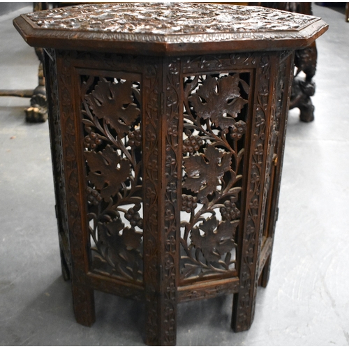 993 - TWO 19TH CENTURY MIDDLE EASTERN LIBERTY STYLE CARVED WOOD TABLES. Largest 50 cm high. (2)