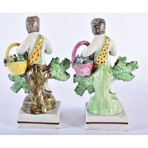 999 - TWO EARLY 19TH CENTURY STAFFORDSHIRE PEARLWARE FIGURES. 11 cm high.