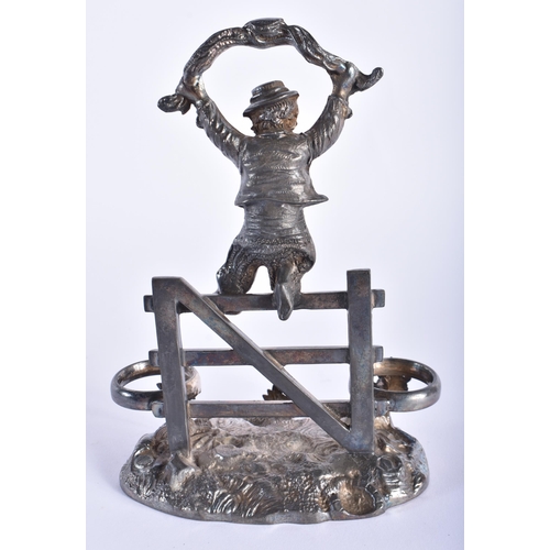 10 - A PAIR OF ANTIQUE SPELTER FIGURES together with a silver plated figural cruet stand. Largest 29 cm h... 