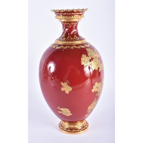 11 - A LARGE ROYAL CROWN DERBY MAROON GROUND PORCELAIN VASE painted in raised gilt with foliage. 32 cm hi... 