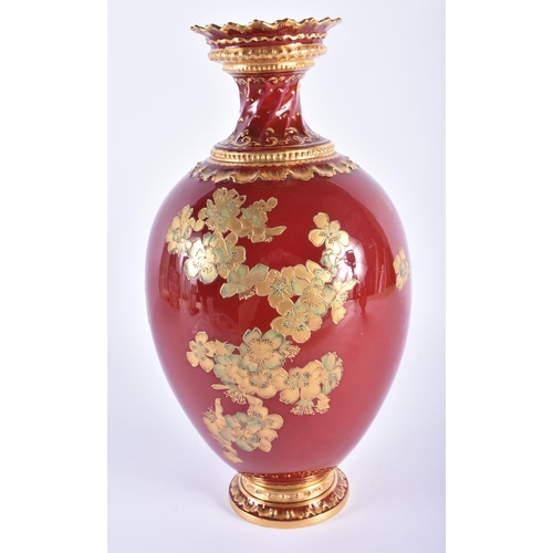 11 - A LARGE ROYAL CROWN DERBY MAROON GROUND PORCELAIN VASE painted in raised gilt with foliage. 32 cm hi... 