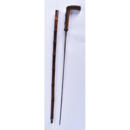 111 - AN ANTIQUE BAMBOO CASED SWORD STICK. 88 cm long.   BUYERS ARE ADVISED TO CONFIRM SHIPPING ARRANGEMEN... 