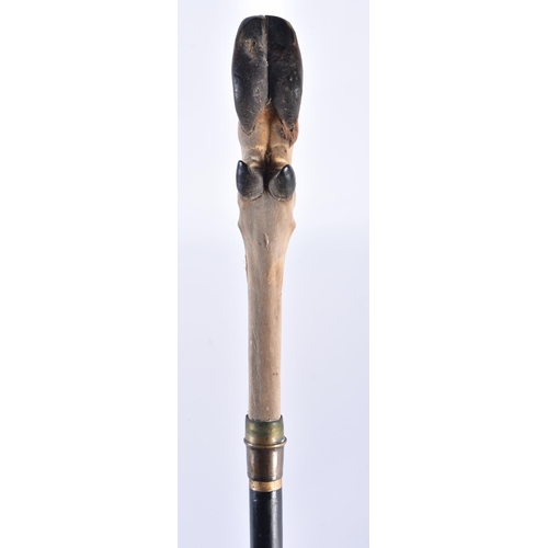 112 - AN ANTIQUE DEER HOOF CASED SWORD STICK. 88 cm long.   BUYERS ARE ADVISED TO CONFIRM SHIPPING ARRANGE... 