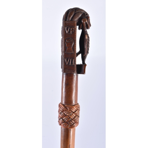 114 - A LOVELY 18TH CENTURY CONTINENTAL CARVED WOOD WALKING CANE of Royal Interest, carved with a lion hol... 