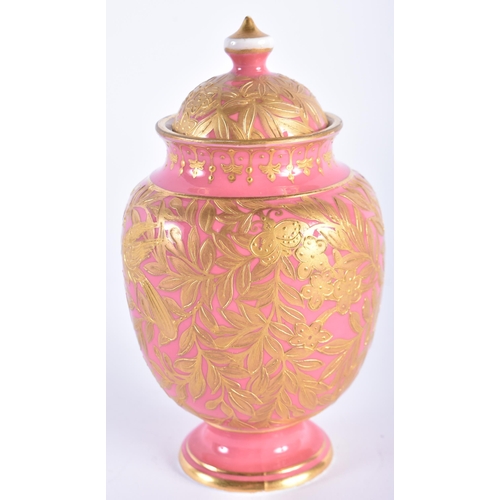 12 - A SMALL ANTIQUE DERBY PINK GROUND PORCELAIN VASE AND COVER painted in raised gilt with foliage. 13.5... 