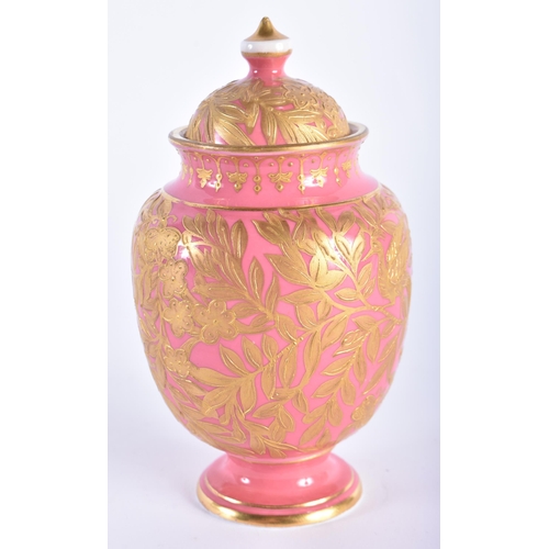 12 - A SMALL ANTIQUE DERBY PINK GROUND PORCELAIN VASE AND COVER painted in raised gilt with foliage. 13.5... 