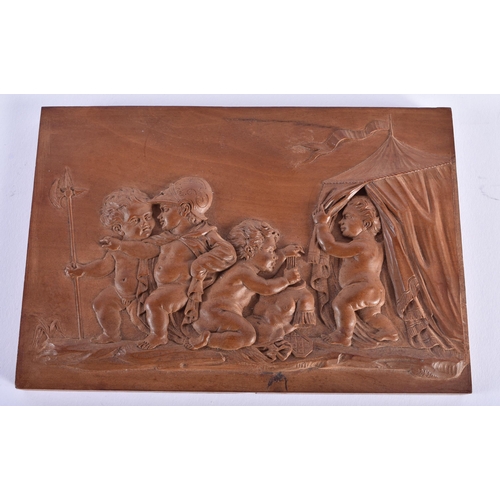 15 - A 19TH CENTURY EUROPEAN CARVED WOOD TREEN PANEL OF FIGURES modelled in various pursuits. 15.5 cm x 1... 