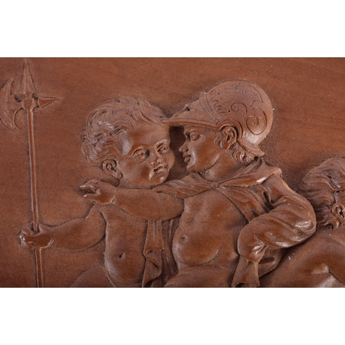 15 - A 19TH CENTURY EUROPEAN CARVED WOOD TREEN PANEL OF FIGURES modelled in various pursuits. 15.5 cm x 1... 