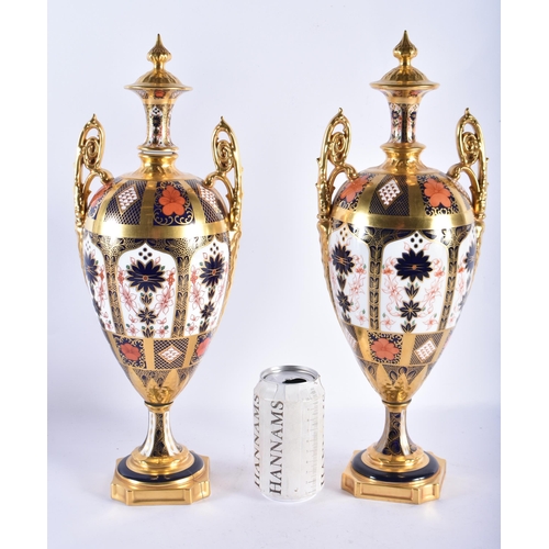 178 - A LARGE PAIR OF ROYAL CROWN DERBY IMARI TWIN HANDLED VASES. 42 cm high.