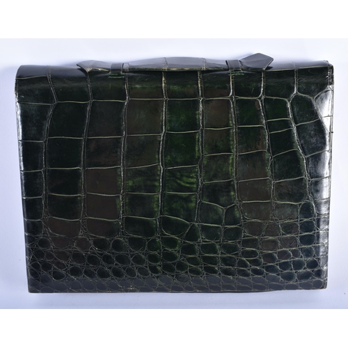 18 - AN EARLY 20TH CENTURY ENGLISH SILVER MOUNTED GREEN CROCODILE SKIN CASE. 27 cm x 22 cm.