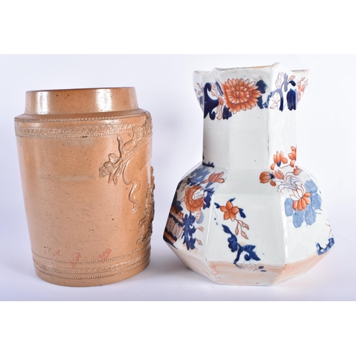 19 - AN EARLY 19TH CENTURY ENGLISH STONEWARE POT together with a Masons hydra jug. Largest 23.5 cm high. ... 