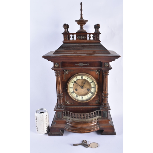 20 - A LARGE VICTORIAN MAHOGANY CLOCK. 60 cm x 27 cm.