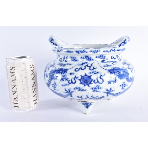 236 - A RARE 19TH CENTURY CHINESE TWIN HANDLED BLUE AND WHITE PORCELAIN CENSER bearing Qianlong marks to b... 